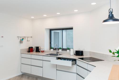Kuchyň nebo kuchyňský kout v ubytování Valenberg Oasis