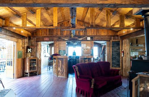 Posezení v ubytování Auberge/Chalet Griffon Aventure