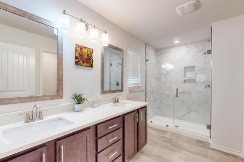 a bathroom with a sink and a shower at Gulf Coast Haven in Aransas Pass