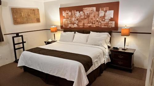 Hotel del Fresnoにあるベッド