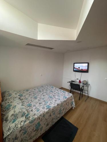 Postel nebo postele na pokoji v ubytování Casa Mendes- Quarto Casal