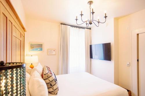 Кровать или кровати в номере Hotel Santa Barbara