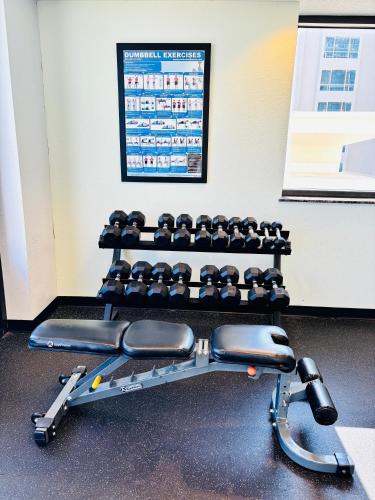 a gym with a row of exercising machines at Pier House 60 Clearwater Beach Marina Hotel in Clearwater Beach