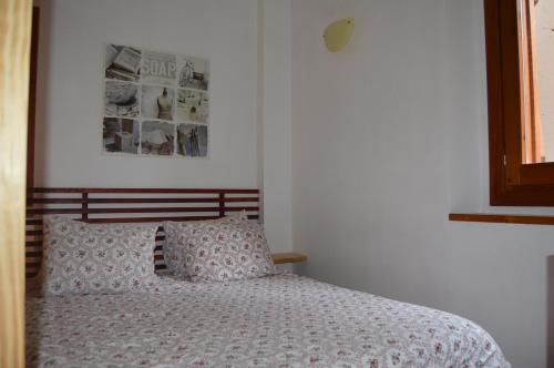 เตียงในห้องที่ Apartamento Pleta de Soldeu