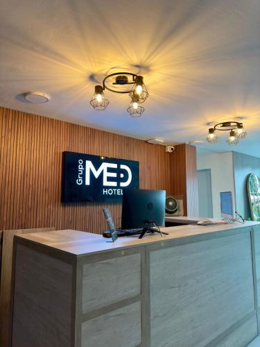 TV a/nebo společenská místnost v ubytování Hotel Med Llanogrande