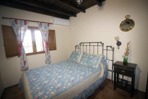 Katil atau katil-katil dalam bilik di Casa Rural El Quinto y Medio