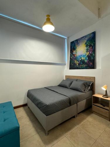 Postel nebo postele na pokoji v ubytování Hostelfc Javeriana