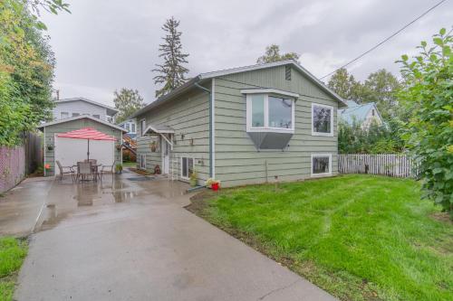 a house with a patio and a yard at The Hometown Family Inn in Fairbanks