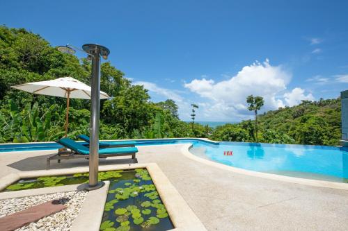 Bazén v ubytování Kata Beach Luxury Condo - Spacious - Exquisitely Furnished - 6min walk to beach - 2025 Booking Traveller Award Winner nebo v jeho okolí