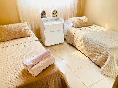 Cama o camas de una habitación en Casas M&G Penedo com vista para a serra
