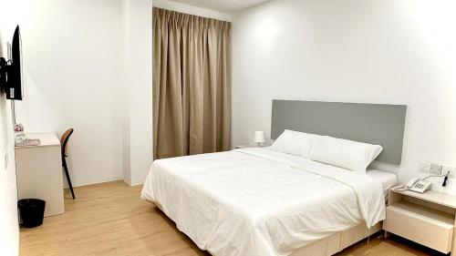 Postel nebo postele na pokoji v ubytování Lawson Inn