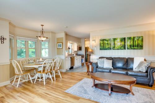 a living room with a couch and a table at Mountain Views Beautiful Nestlenook Farm Home! in Jackson