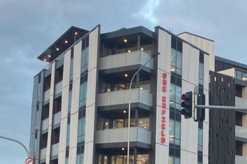 a building with a traffic light in front of it at No 1 Location in Mt Eden! in Auckland