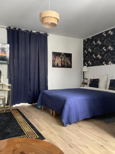 Postel nebo postele na pokoji v ubytování Retro Hideaway