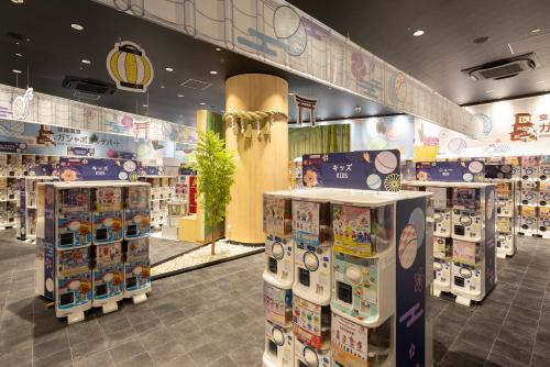 a store with a lot of products on display at Art Hotel Osaka Bay Tower in Osaka