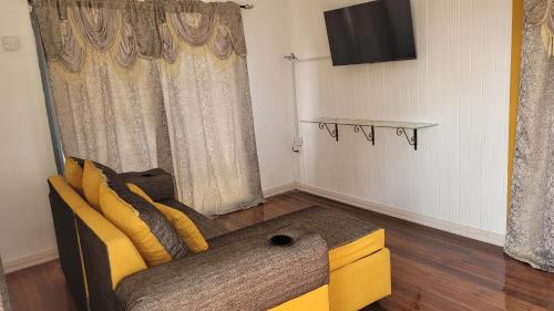 TV a/nebo společenská místnost v ubytování AOS Rentals