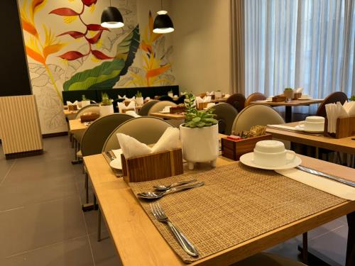 Un lugar para sentarse en Hotel Roochelle Convention By Nobile