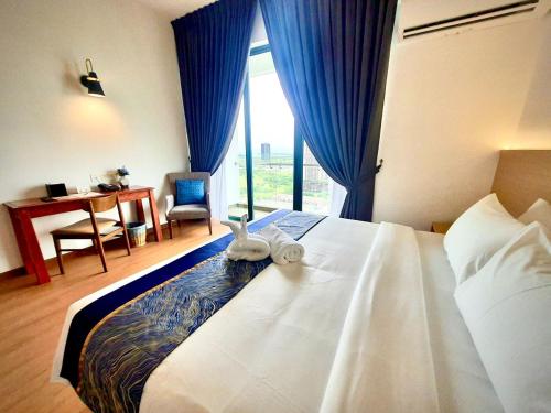 Ένα ή περισσότερα κρεβάτια σε δωμάτιο στο Swan Garden Resort Hotel