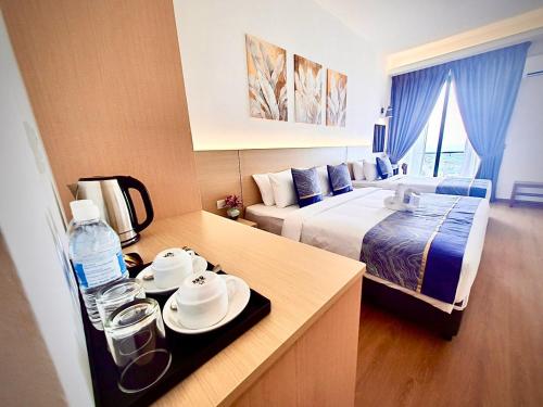 Ένα ή περισσότερα κρεβάτια σε δωμάτιο στο Swan Garden Resort Hotel