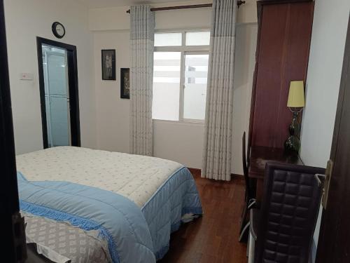 Postel nebo postele na pokoji v ubytování Nuwara eliya Luxury Apartment