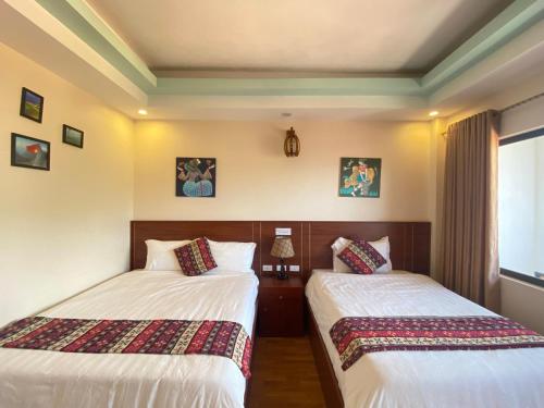 Postel nebo postele na pokoji v ubytování Misty Hostel Sapa