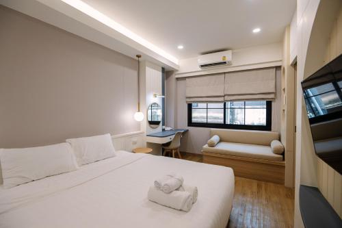 Ένα ή περισσότερα κρεβάτια σε δωμάτιο στο Moon House BKK Room 3B