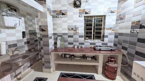 Kuchyň nebo kuchyňský kout v ubytování Veda Home's
