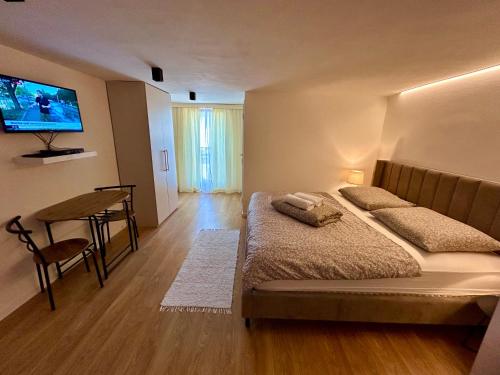 Katil atau katil-katil dalam bilik di Apartments ZARA