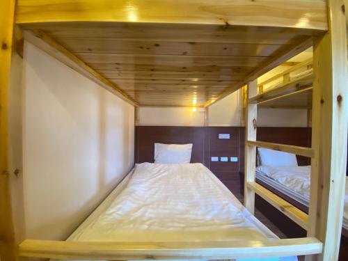 Postel nebo postele na pokoji v ubytování Misty Hostel Sapa