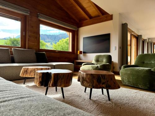 Posezení v ubytování Chalet du Feug