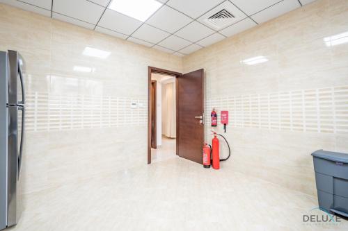 a room with two fire hydrants on the wall at Deal of the Week 4BR with Pool, Sea & Mountain Views by Deluxe Holiday Homes in Sharm