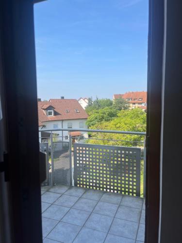 a view from a balcony of a house at Kleines Dachzimmer mit Balkon in Feucht