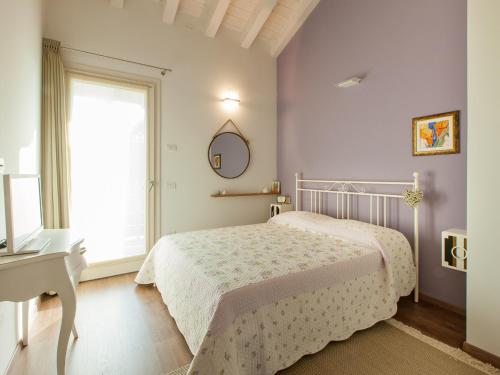 Posteľ alebo postele v izbe v ubytovaní B&B Cà Dea Calle
