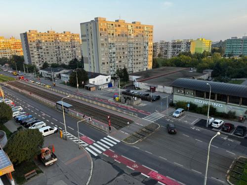 an aerial view of a city with a street with cars at Smarty Choice Living with FREE PARKING - Vondroušova in Prague