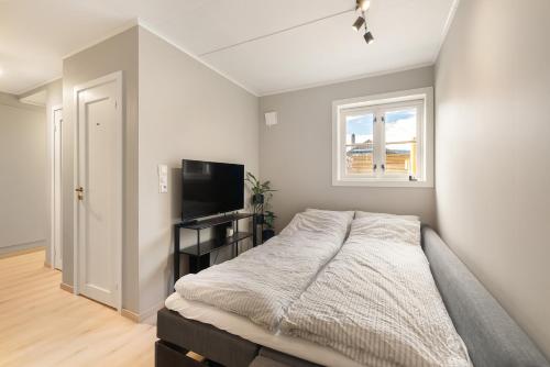Ένα ή περισσότερα κρεβάτια σε δωμάτιο στο Central and modern apartment
