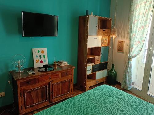 Телевизор и/или развлекательный центр в We # Are ai Cassarelli