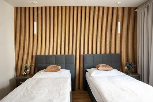 Postel nebo postele na pokoji v ubytování Hotel Sharingham