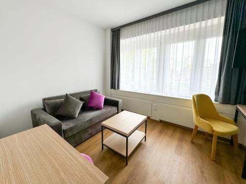 DORMERO Hotel Rüsselsheim Airport-Frankfurtにあるシーティングエリア