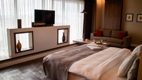 Katil atau katil-katil dalam bilik di Sam Royal Hotel