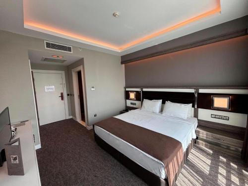 Katil atau katil-katil dalam bilik di Sam Royal Hotel