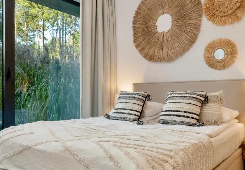 Ένα ή περισσότερα κρεβάτια σε δωμάτιο στο Shelter Luxury Apartament