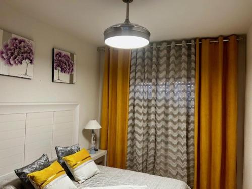 Postel nebo postele na pokoji v ubytování Apartamento Plaza España