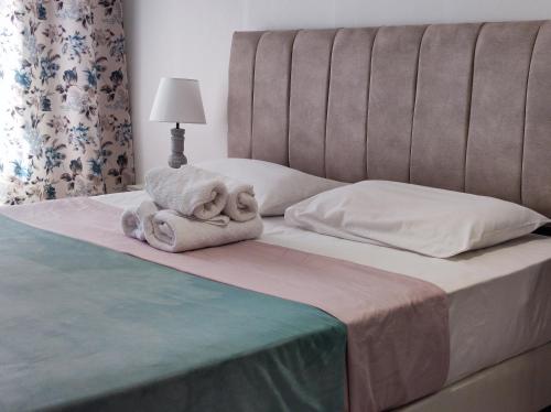 Llit o llits en una habitació de Friendly Guest House