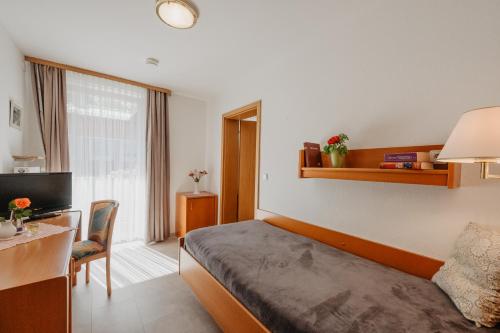 Letto o letti in una camera di Haus Hildegard