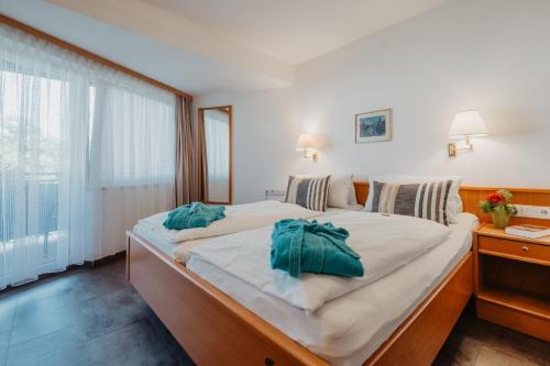 Letto o letti in una camera di Haus Hildegard