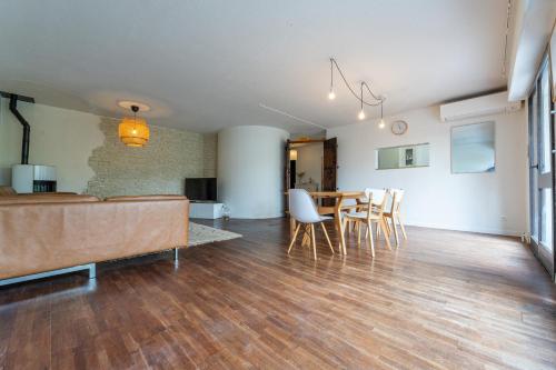 Μια τηλεόραση ή/και κέντρο ψυχαγωγίας στο Le Duplex - Appartement 3 Chambres à Bordeaux
