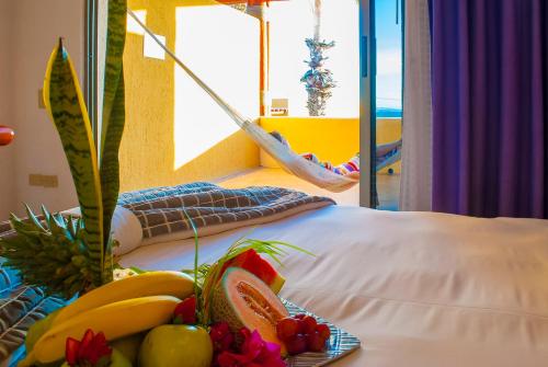 Postel nebo postele na pokoji v ubytování Hotel Los Patios