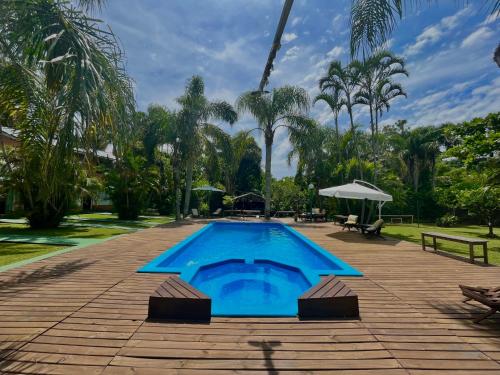Kolam renang di atau dekat dengan Pousada em Bombinhas Jardin Flamingo