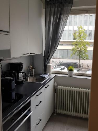 Foto Kotimaailma Apartments - 1BR in city center of Turku 6