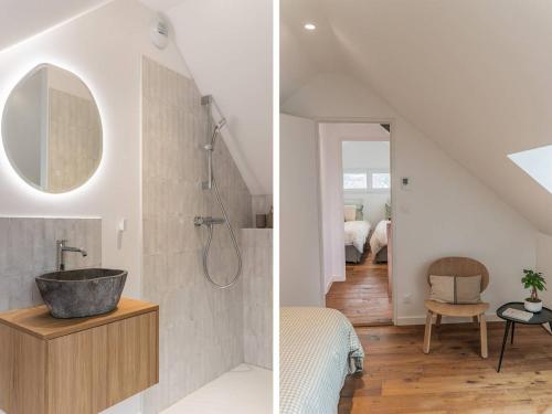 une salle de bain avec un lavabo et un miroir dans l'établissement Grand Appart Luxe 8 Pers Centre-ville avec Parking - FR-1-234-320, à Cauterets